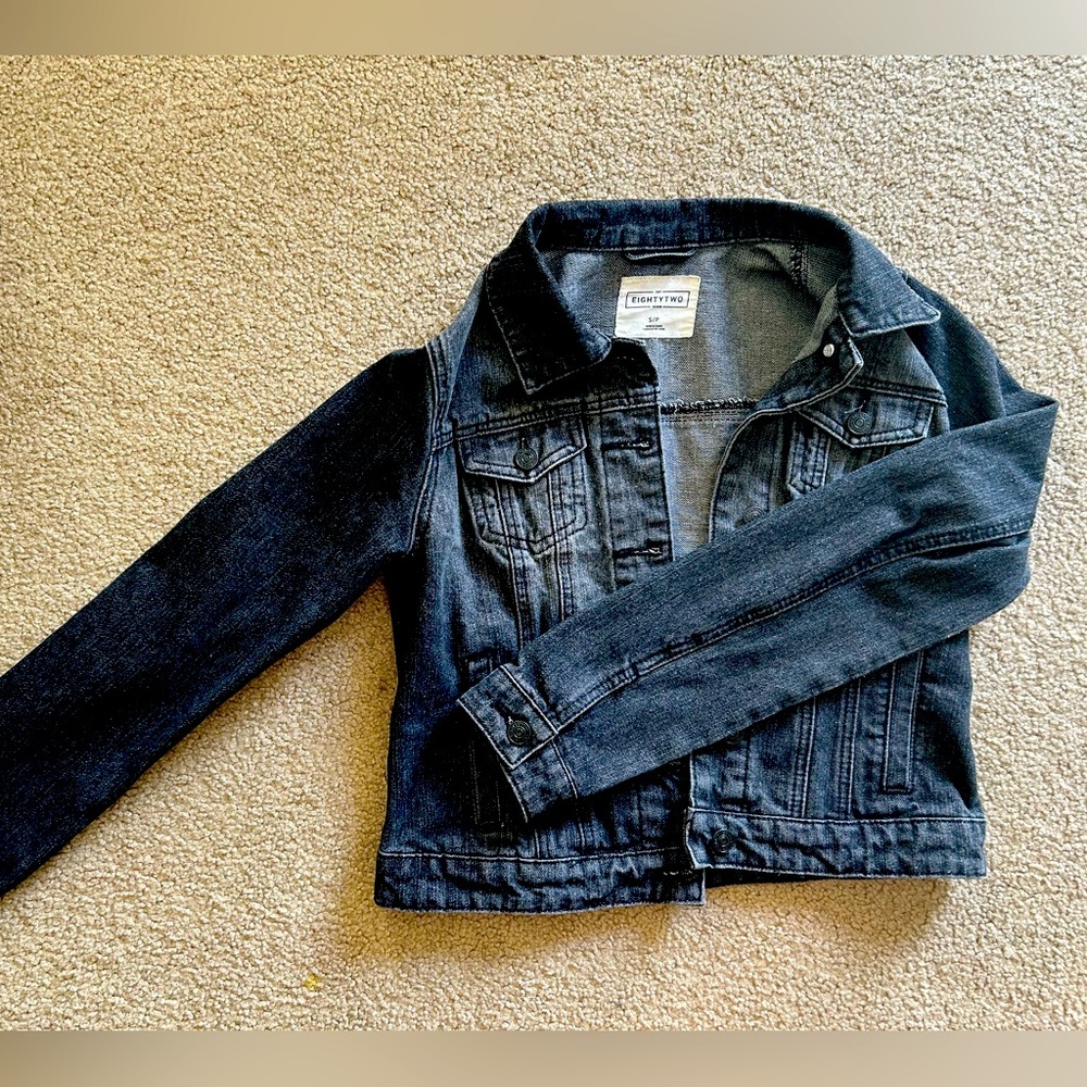 Faded style black denim jacket.